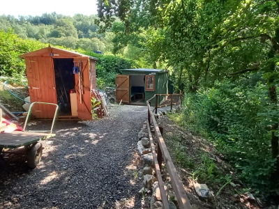 Out of site from the station,  and located below the down platform hedge are our work and store sheds. This position allows us to carry out various tasks to support everything at Chelfham.