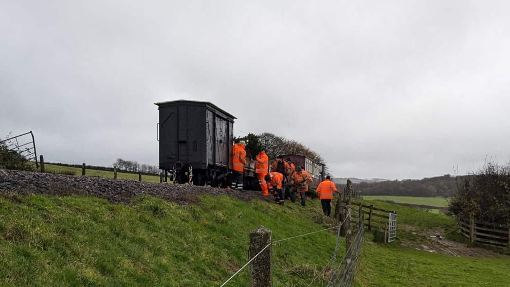 Before the rain began, the gang give the lineside some attention near the site of bridge 66.