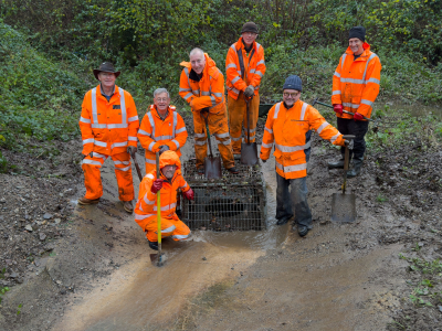 Pit successfully cleaned out - smiles all round. Day 3 November Work Weekend.